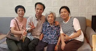 20230801_Deng-Tianyong-with-his-family-after-his-release.png
